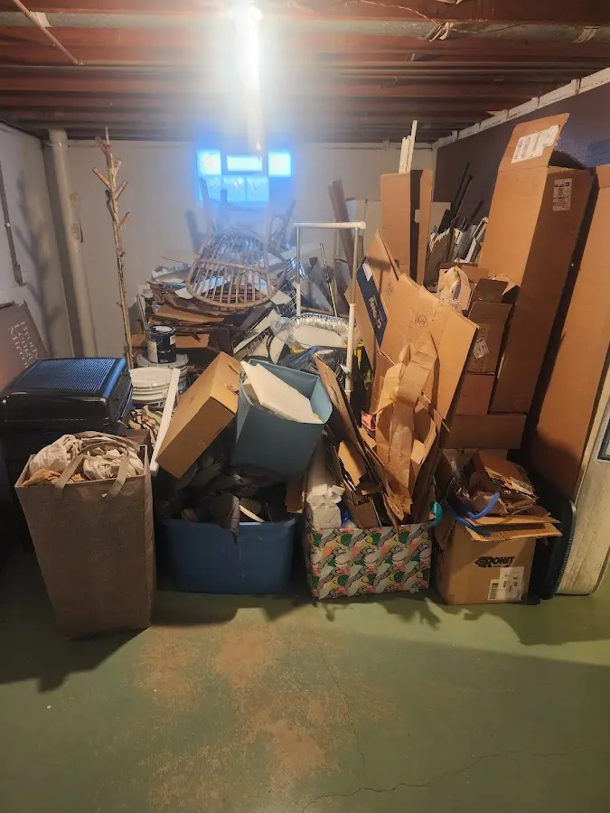 Roll-off dumpster container at job site for Roll Off Dumpster Rental in Negaunee